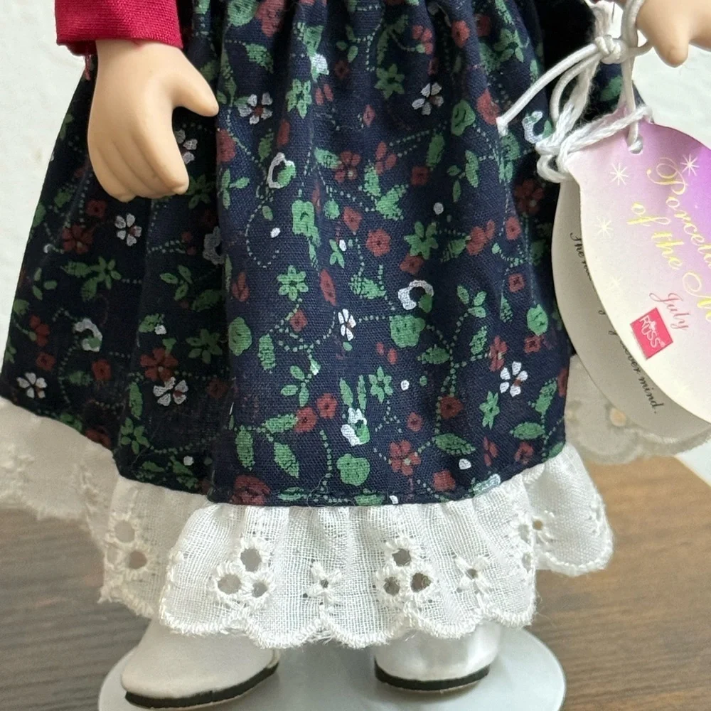 Russ Doll with Navy Floral Dress and Red Accents